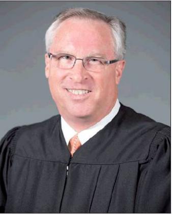 Associate District Judge Michael Flanagan